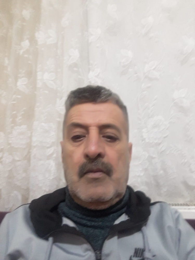 الأستاذ حسن العلي